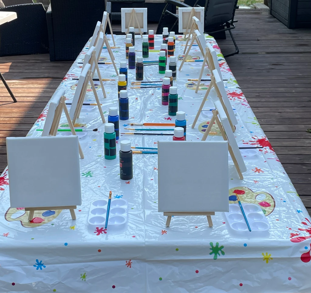 A bunch of easels and canvases