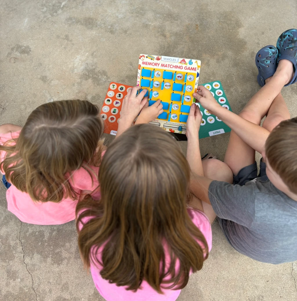 Kids playing a memory match game