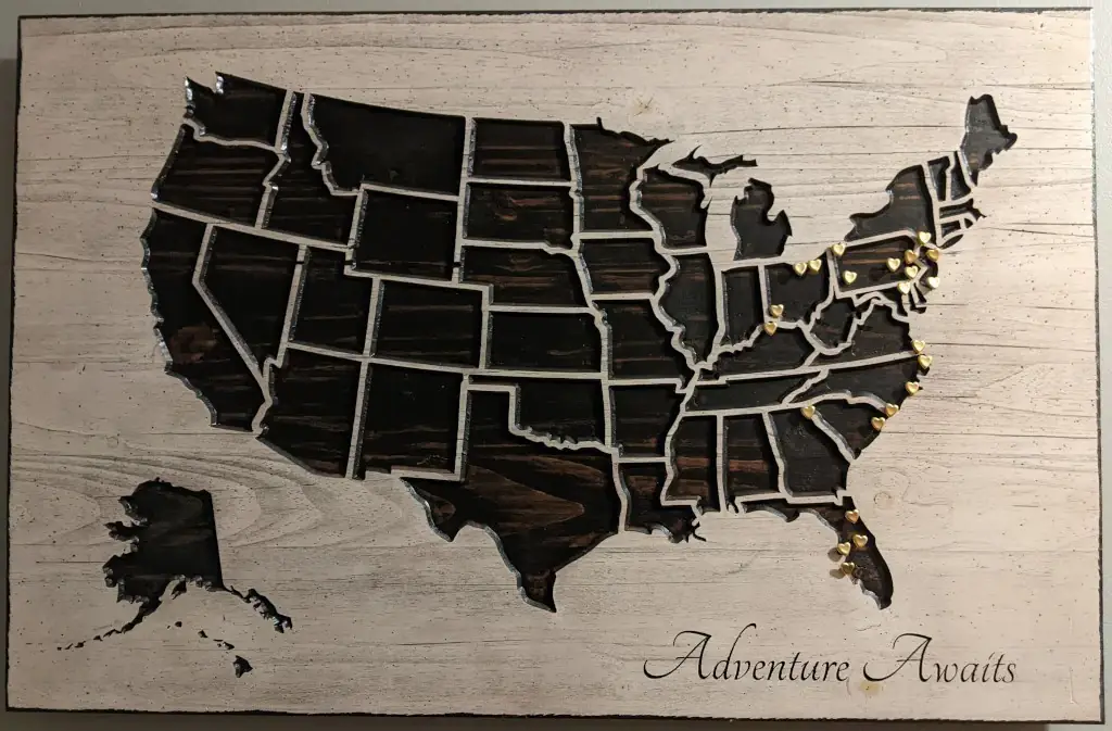 A map of the USA with heart pins in it