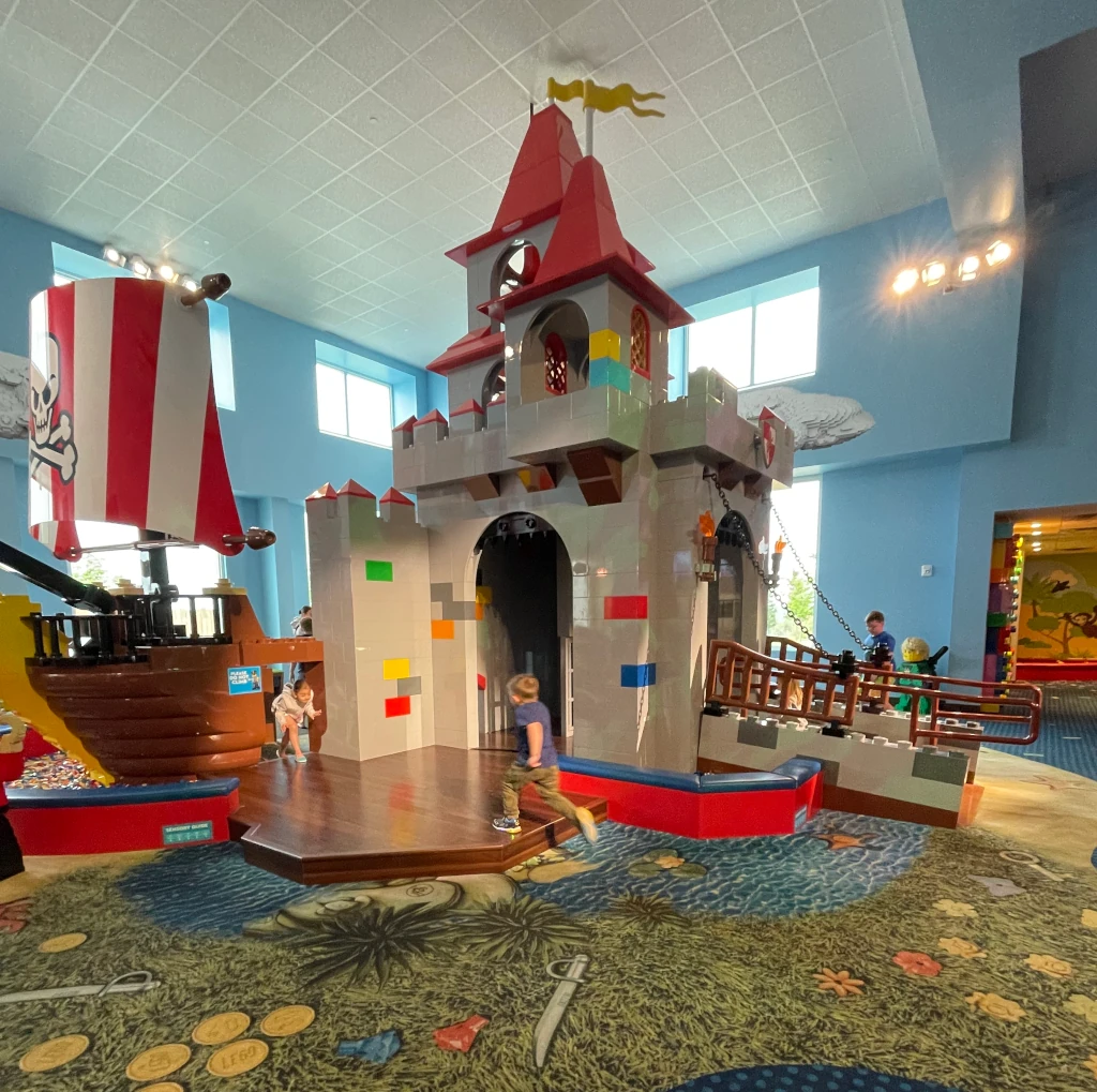 A large Lego-themed play castle