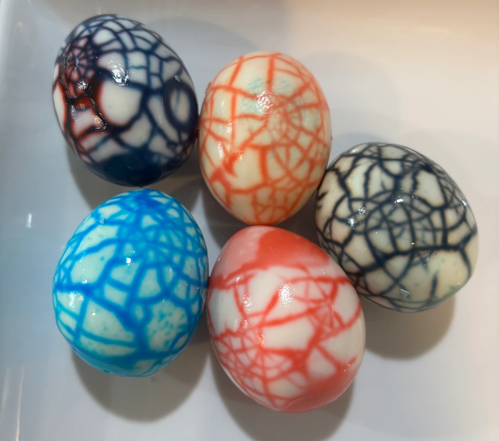 Hardboiled eggs with colorful designs