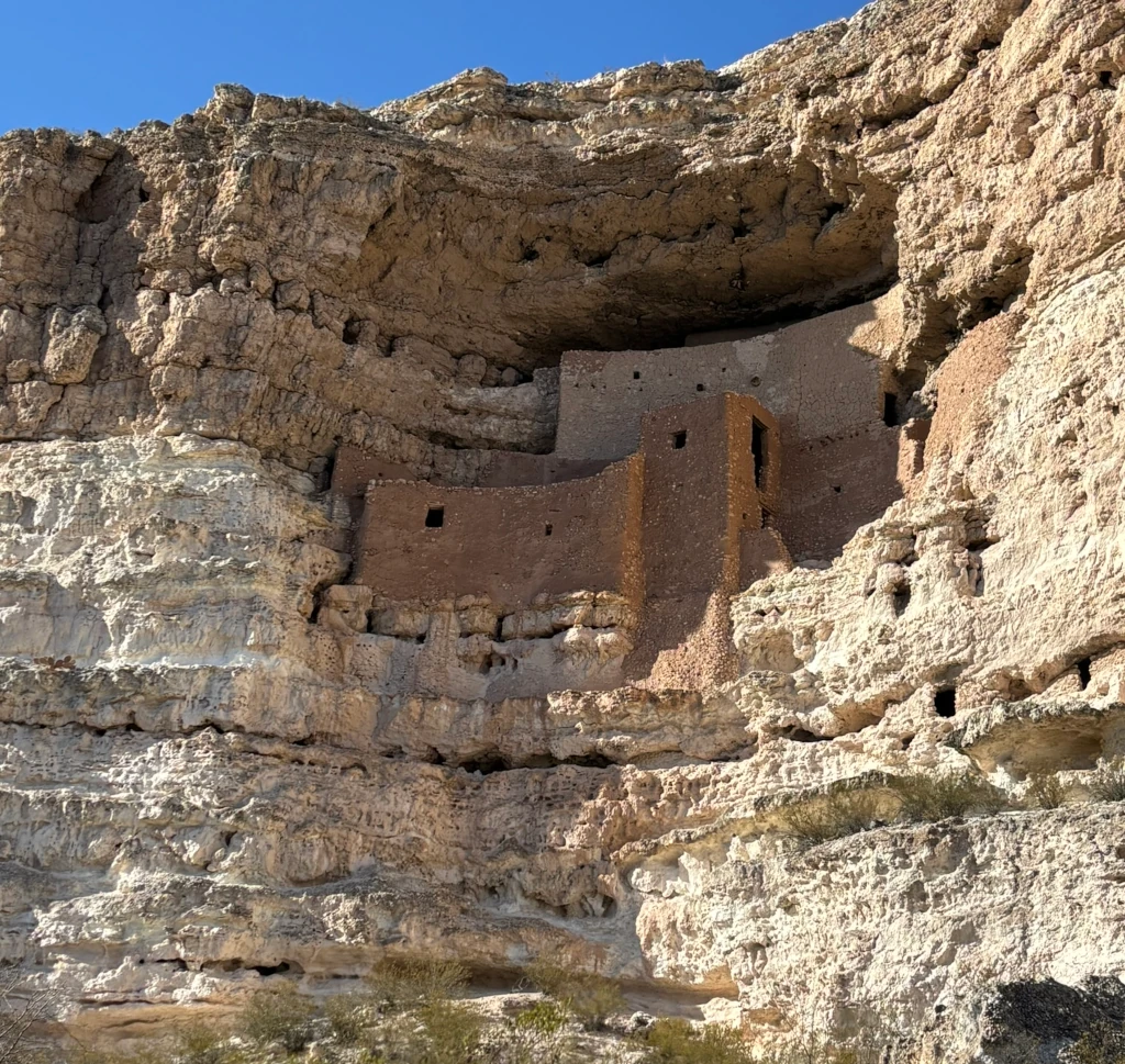 A pueblo house built into a cliff