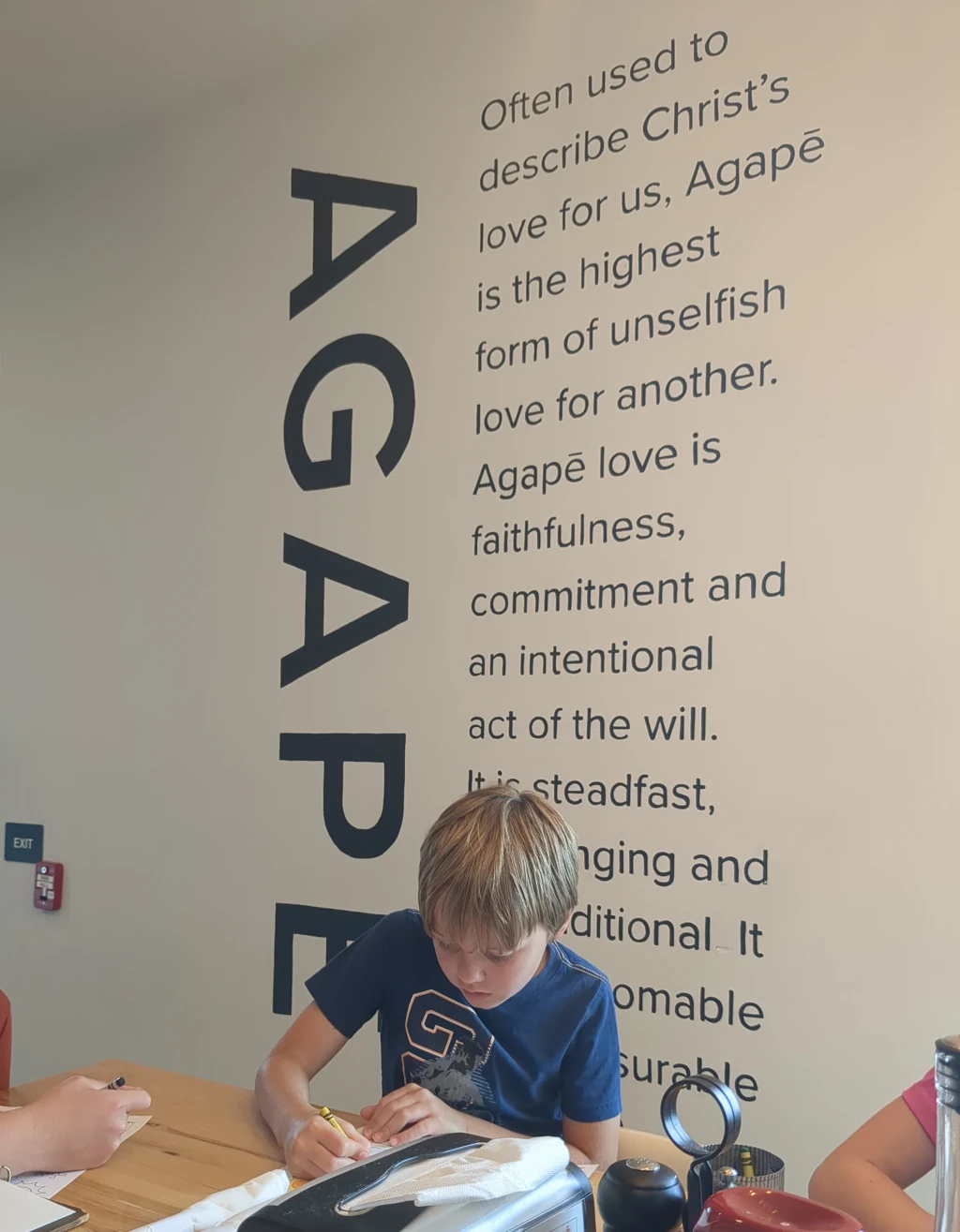 A sign that says AGAPE