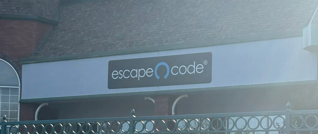 A sign saying 'Escape Code'