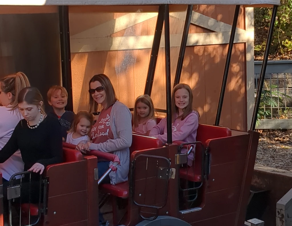 A family riding an amusement park ride