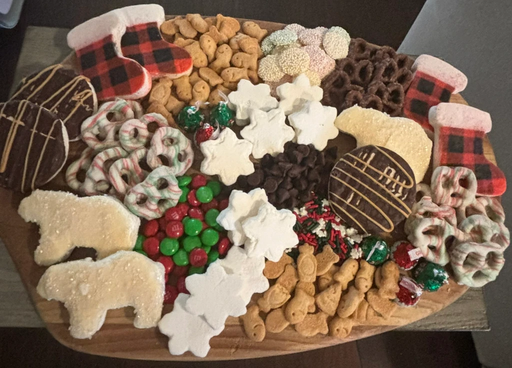 A board with assorted foods for putting in hot chocolate