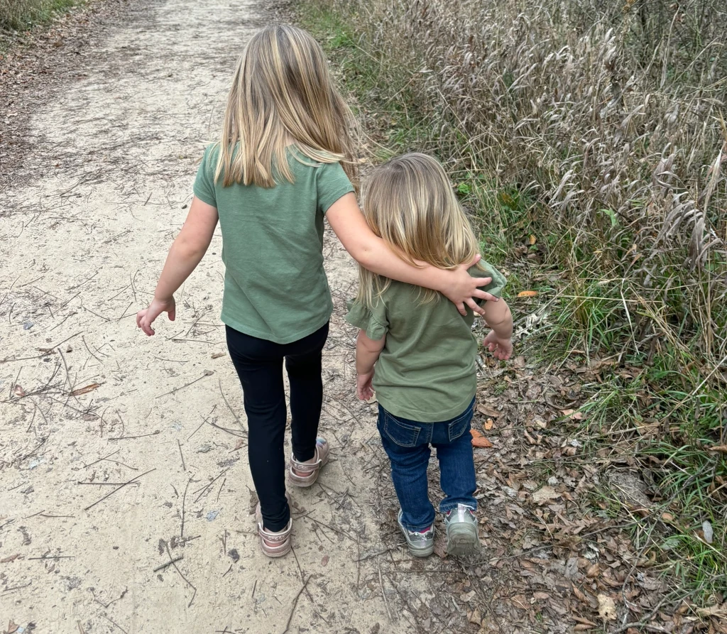 Two little girls on a hike