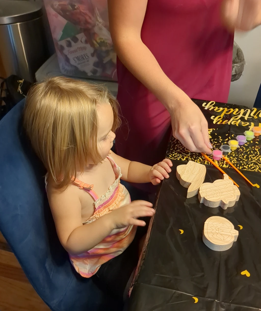 Our youngest daughter doing crafts at the table