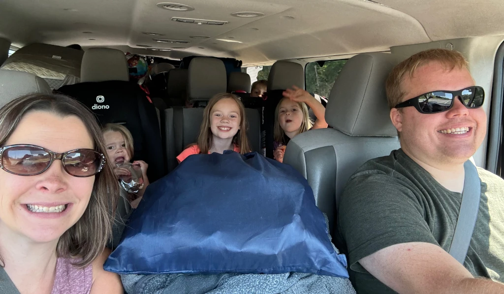 The family driving in our big van